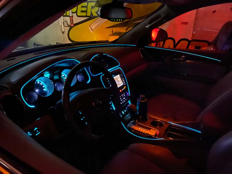 Interior of a car, customized with lights by Bumper to Bumper Car Audio