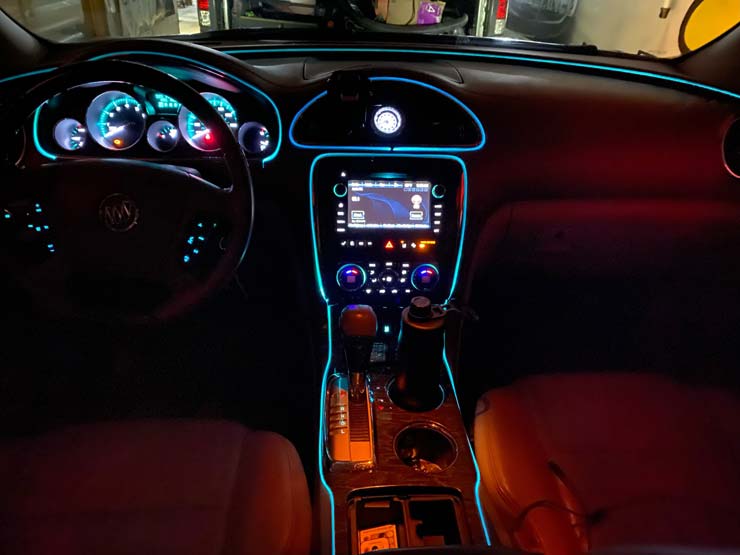 Interior of a car, customized with lights by Bumper to Bumper Car Audio